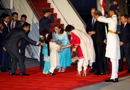 Britain's Prince William and Catherine, Duchess of Cambridge, arrive in Islamabad