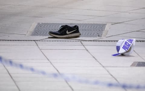 A discharged taser, shoe and paramedic equipment on Metrolink platform B at Victoria Station  - Credit: Joel Goodman/LNP