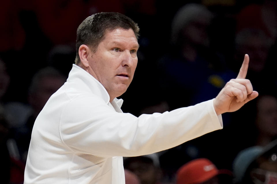 FILE - Clemson head coach Brad Brownell works the bench during the first half of an NCAA college basketball game against North Carolina State during the Atlantic Coast Conference men's tournament, Tuesday, March 8, 2022, in New York. Brownell is entering his 13th season with the Tigers — only Leonard Hamilton of Florida State and Tony Bennett of Virginia have held positions in the Atlantic Coast Conference longer — and hopes the season doesn't become a game-by-game referendum on his job status. (AP Photo/John Minchillo, File)