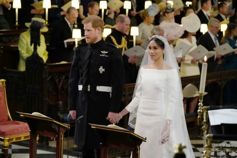 Markle's veil was held in place by Queen Mary's diamond bandeau tiara, which was loaned to her by Queen Elizabeth II