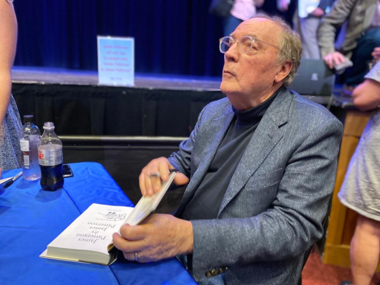 Bestselling author James Patterson signs copies of his newly released memoir, "James Patterson by James Patterson" inside W.K. Kellogg Auditorium in Battle Creek, Mich. on Tuesday, June 14, 2022.