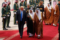 <p>President Donald Trump walks with Saudi King Salman during a welcome ceremony at the Royal Terminal of King Khalid International Airport, Saturday, May 20, 2017, in Riyadh. (Photo: Evan Vucci/AP) </p>