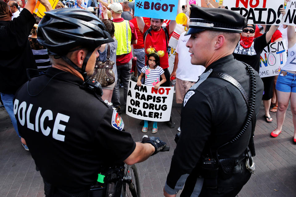 <p>Protesters picket outside the site of Donald Trumps’s rally before the Republican presidential candidate begins speaking to supporters in Albuquerque, N.M., Tuesday, May 24, 2016. (Reuters/Jonathan Ernst) </p>