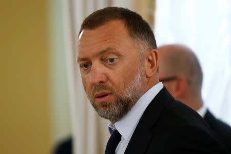 FILE PHOTO: Oleg Deripaska looks on before a meeting of Russian President Vladimir Putin and Turkish President Tayyip Erdogan with Russian and Turkish entrepreneurs at the Konstantinovsky Palace in St. Petersburg, Russia, August 9, 2016. REUTERS/Sergei Karpukhi