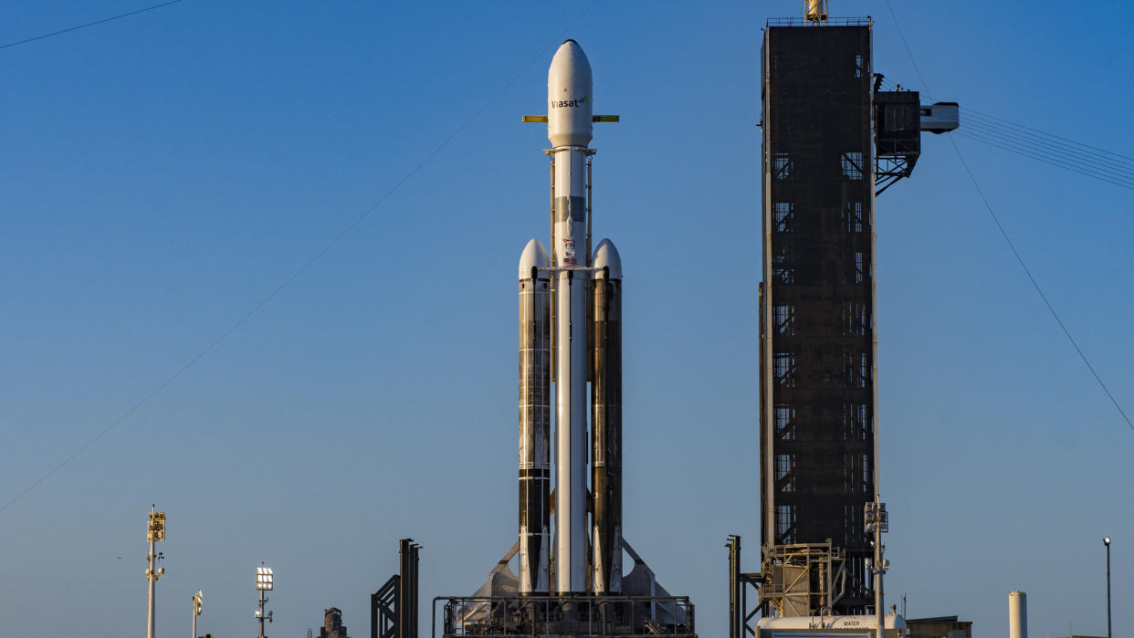  A SpaceX Falcon Heavy rocket carrying the ViaSat-3 satellite and other payloads stands atop Pad 39A at NASA's Kennedy Space Center in Florida for an April 26, 2023 launch. 