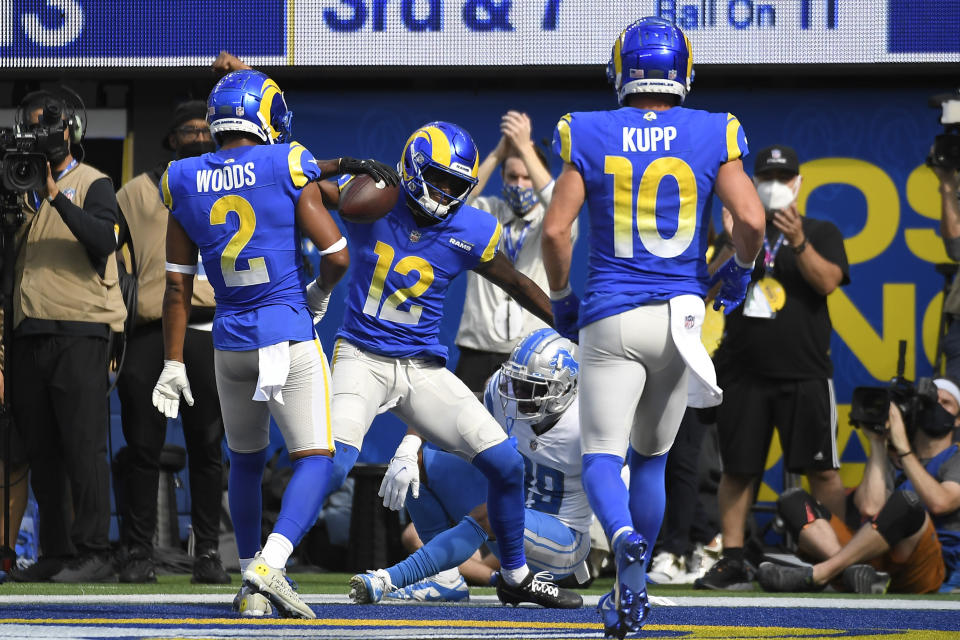 Los Angeles Rams wide receiver Van Jefferson (12) celebrates with teammates after scoring a touchdown during the first half of an NFL football game against the Detroit Lions Sunday, Oct. 24, 2021, in Inglewood, Calif. (AP Photo/Kevork Djansezian)