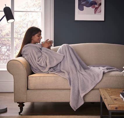 Help keep your girlfriend who’s always cold warm with this wearable blanket