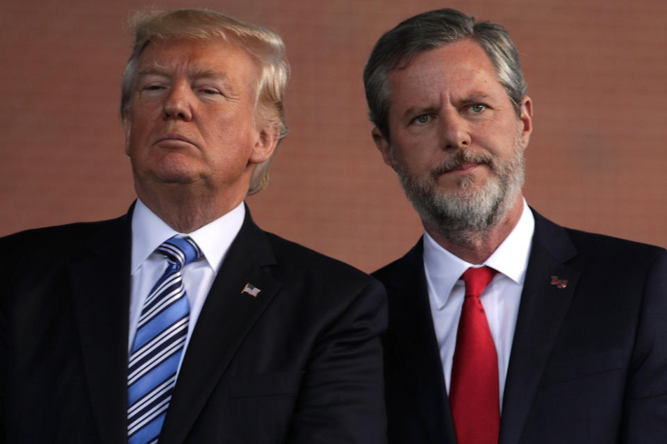 U.S. President Donald Trump (left) and Jerry Falwell (right), president of Liberty University, on stage during a commencement at Liberty University, May 13, 2017, in Lynchburg, Virginia. (Photo: Alex Wong via Getty Images)