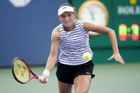 Varvara Gracheva, of Russia, returns a shot to Kristina Mladenovic, of France, during the second round of the US Open tennis championships, Wednesday, Sept. 2, 2020, in New York. (AP Photo/Seth Wenig)