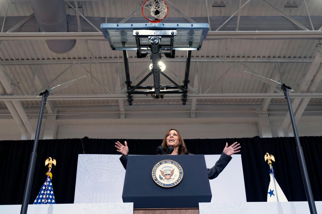 Vice President Kamala Harris speaks below a basketball hoop at the Northeast Bronx YMCA, in the Bronx borough of New York, Friday, Oct. 22, 2021.