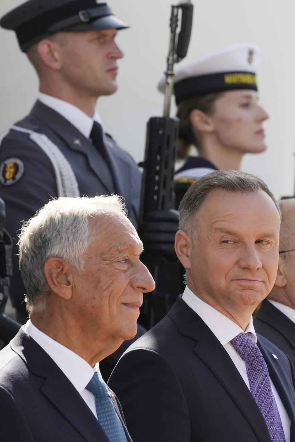 Poland's President Andrzej Duda, right, receives Portuguese President Marcelo Rebelo de Sousa during a state visit at the Belvedere Palace in Warsaw, Poland, Tuesday, Aug. 22, 2023. At a joint news conference de Sousa vowed continuing support for Ukraine's struggle against Russia's invasion, while Duda said Poland is watching Russia's transfer of some nuclear weapons into neighbouring Belarus. (AP Photo/Czarek Sokolowski)