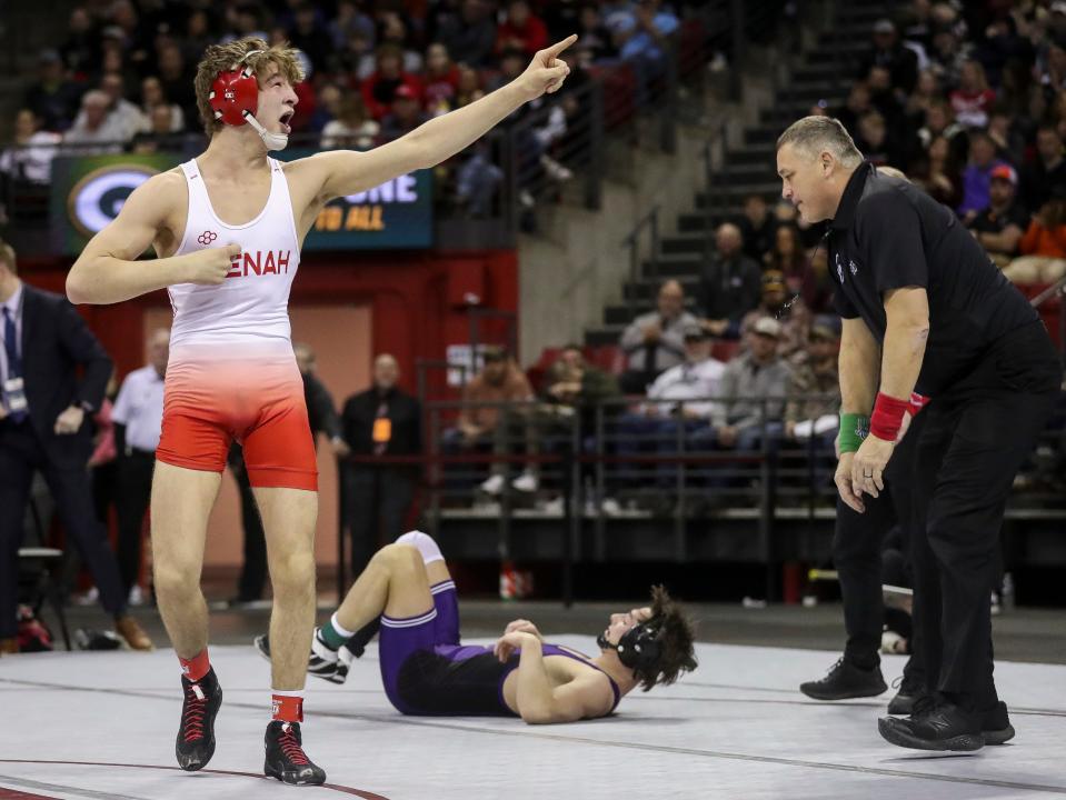 Neenah's Jacob Herm celebrates after defeating Stoughton's Cole Sarbacker in a Division 1 144-pound championship match during the WIAA state individual wrestling tournament Saturday at the Kohl Center in Madison.