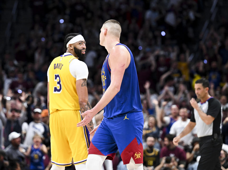 Los Angeles Lakers forward Anthony Davis reacts after a 3-pointer by Denver Nuggets center Nikola Joki&#x000107; during Game 1 of the Western Conference finals at Ball Arena in Denver on May 16, 2023. (Wally Skalij / Los Angeles Times via Getty Images)