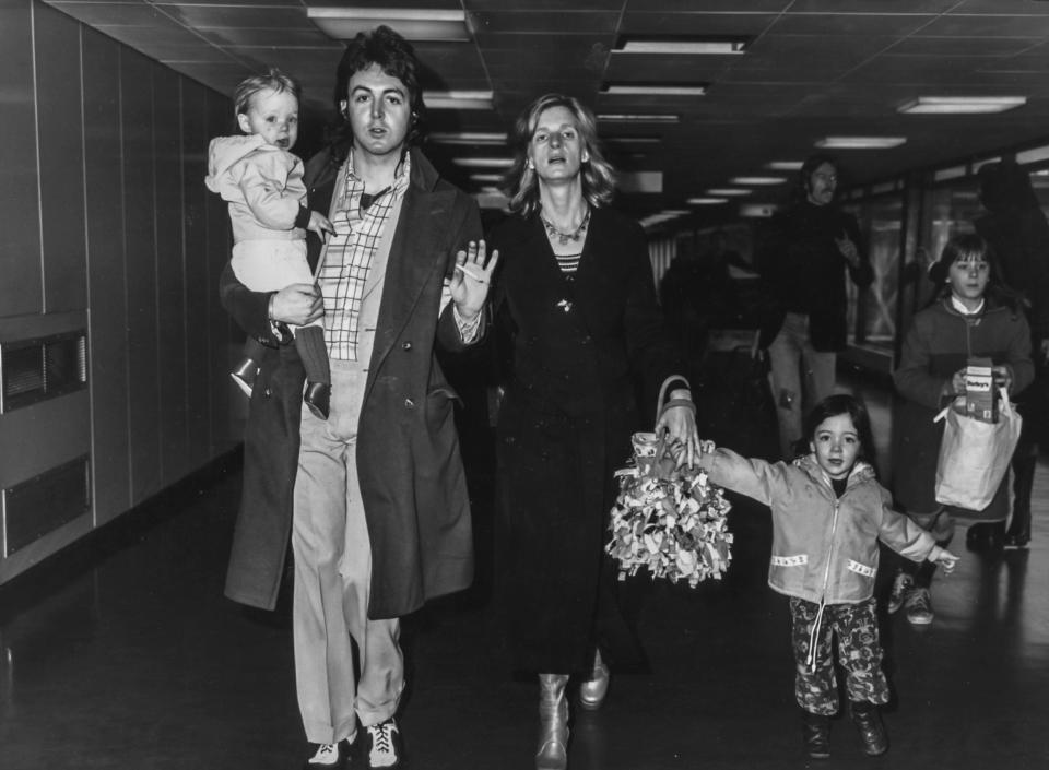 Paul McCartney and family, London airport, 1972.