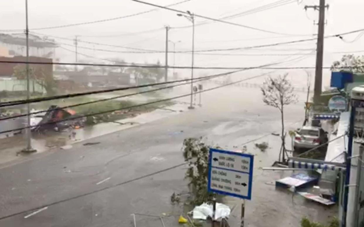 A storm batters a street in Nha Trang, as Typhoon Damrey descends on southern Vietnam - REUTERS