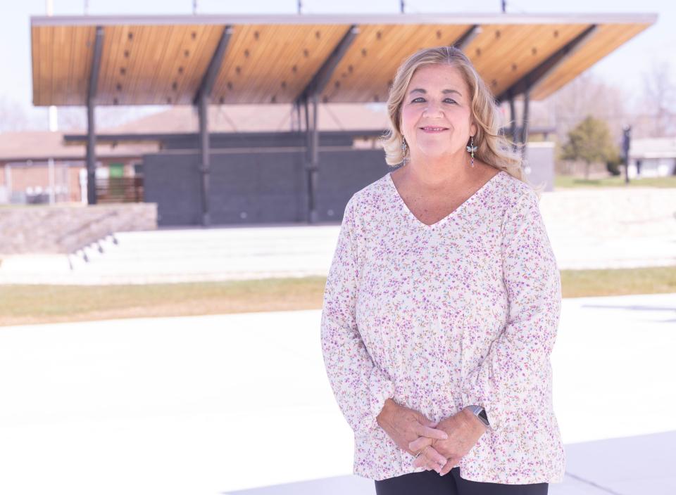 Denise Evans is a lifetime resident of Plain Township. She is also a Realtor for Cutler Real Estate. Here, she is photographed at the Plain Township Amphitheater.