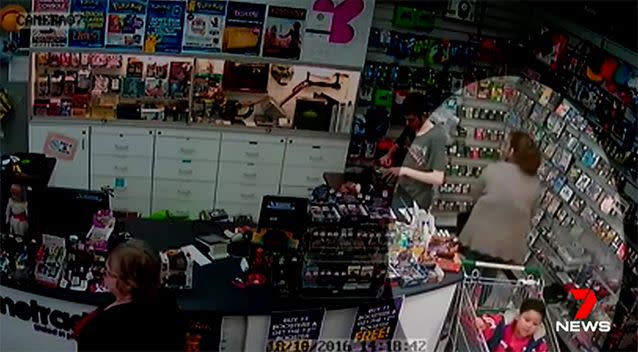 One woman uses her child to conceal her stolen goods. Photo: 7 News