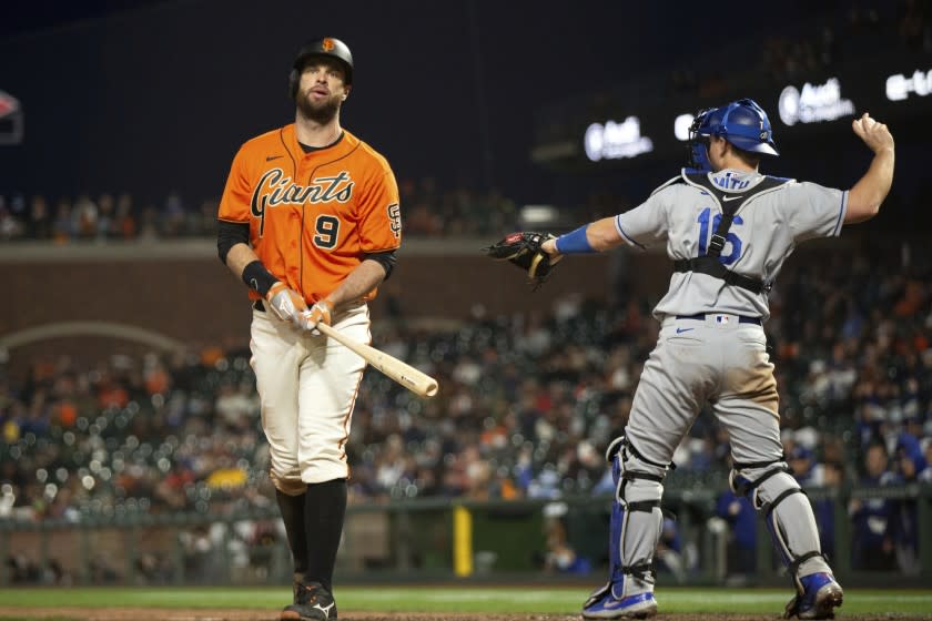 San Francisco Giants' Brandon Belt (9) reacts to striking out during the sixth inning.