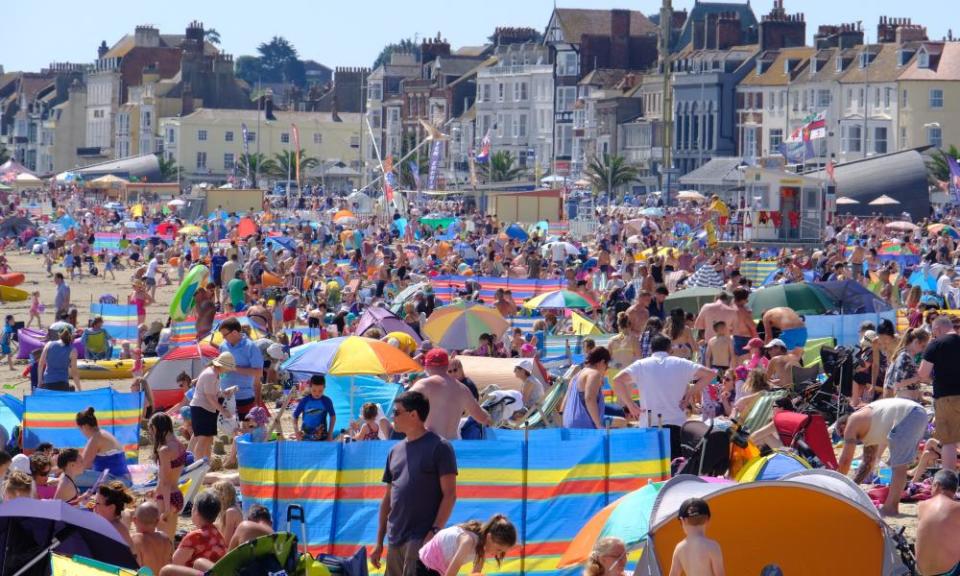Holidaymakers packed on to the beach at Weymouth.