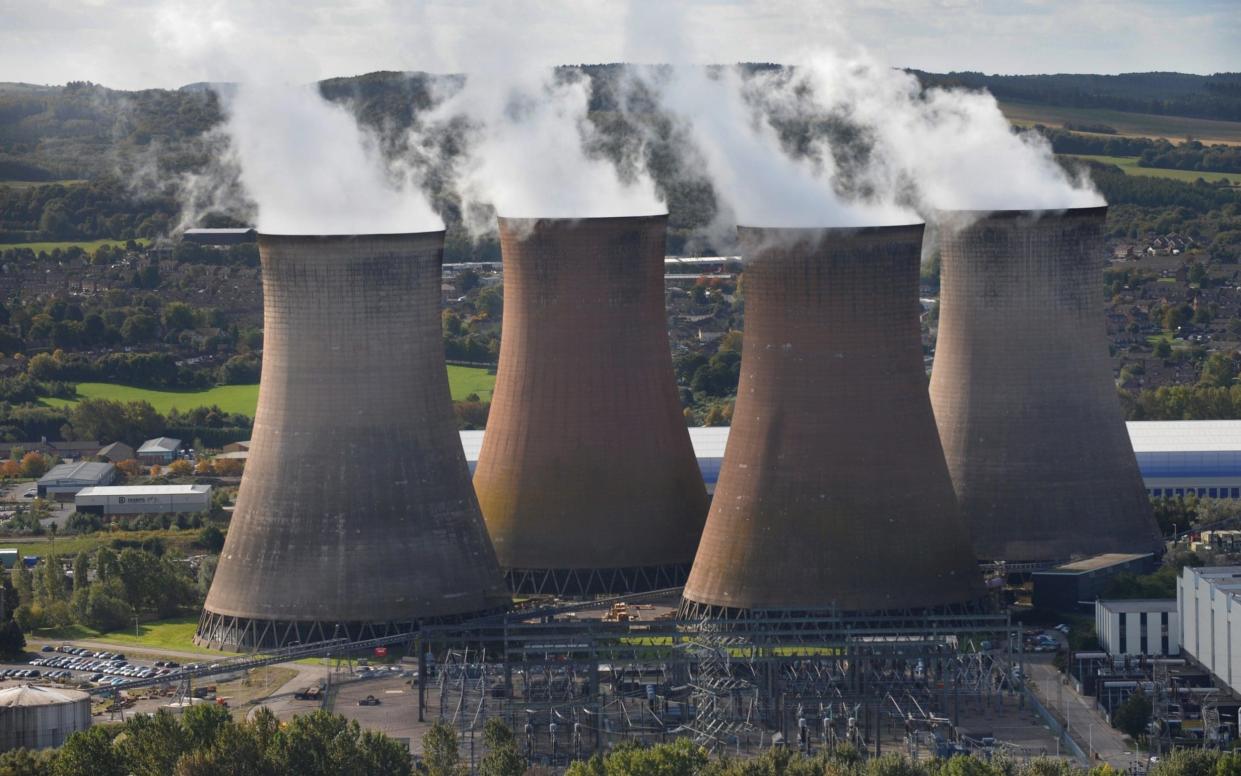 RUGELEY, UNITED KINGDOM - OCTOBER 8: Rugeley Power Station is seen in this aerial photo taken on October 8, 2008 in Rugeley, Staffordshire, England. Gas and electricity prices have soared over recent months, and have been largely blamed for a hike in consumer inflation which hit 5.2% in the UK today. (Photo by David Goddard/Getty Images) - Getty Images