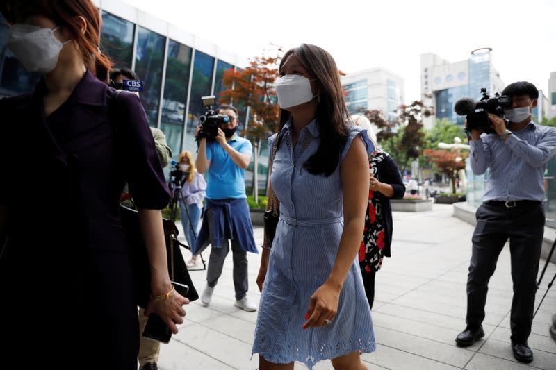 Kara Bos, whose Korean name is Kang Mee-sook when she was adopted in 1984 and is now seeking her biological parents, arrives to attend her trial at a court in Seoul