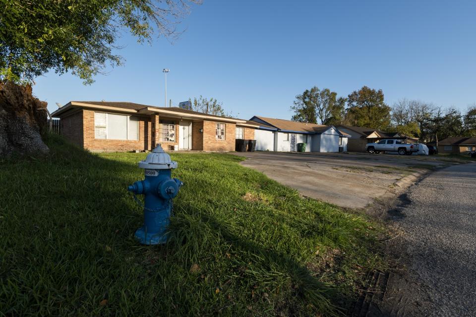 The homes on Talismans Court lay in the projected path of the Interstate 45 expansion Friday, Nov. 19, 2021, in Houston. A $9 billion highway widening project being proposed in the Houston area could become an important test of the Biden administration’s commitment to addressing what it says is a history of racial inequity with infrastructure projects. (AP Photo/Justin Rex)