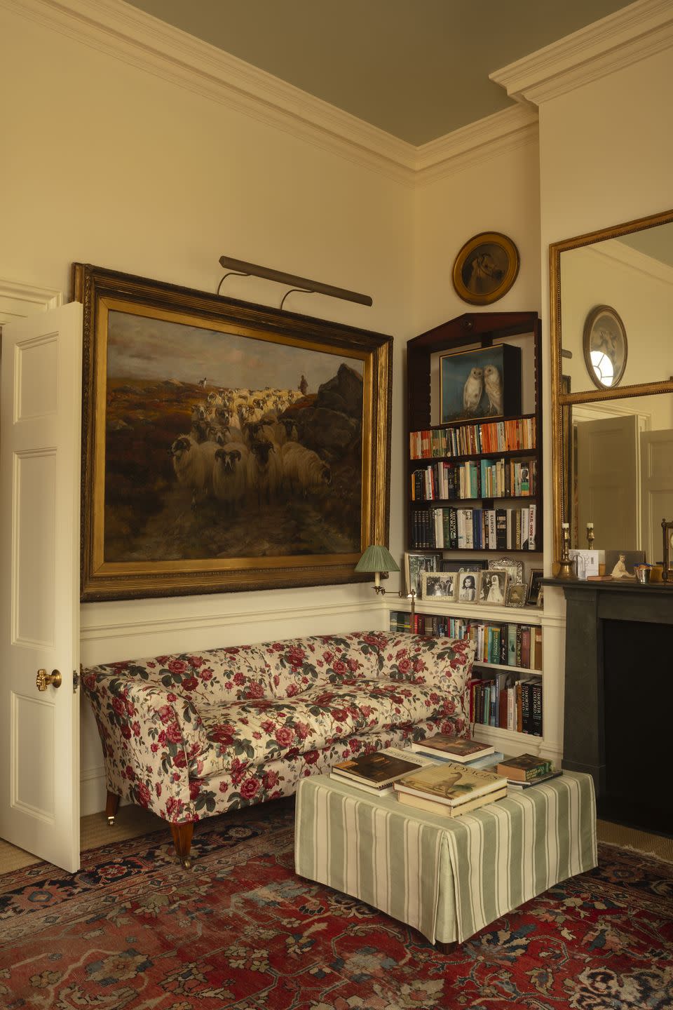 a living room with a red couch