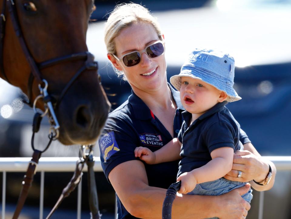 Zara Tindall holds her son Lucas at the 2022 Festival of British Eventing.