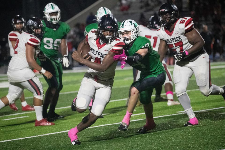 Victor Jenkins of South Fort Myers runs the ball on Friday, Oct. 13, 2023, at Fort Myers High School.