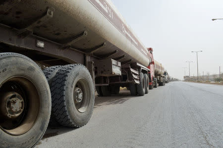 Fuel tanker trucks carrying smuggled petrol are seen on a road linking Bir Ali with Ataq city, the provincial capital of Shabwa province, Yemen, January 10, 2016. REUTERS/Stringer