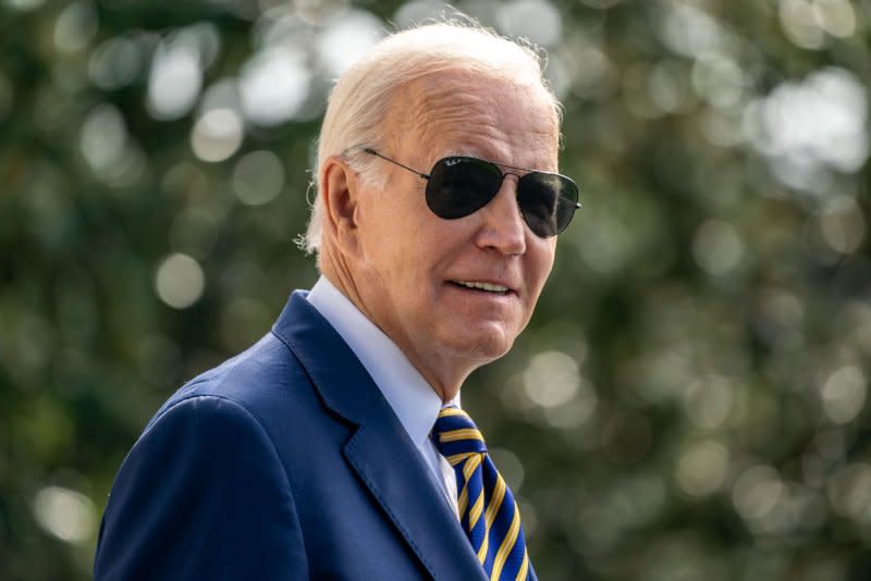 President Joe Biden walks on the South Lawn of the White House on Tuesday before boarding Marine One in Washington, D.C., for a speaking engagement in Wisconsin. Biden told reporters he plans to travel to Maui in the coming weeks to tour the devastation. Photo by Nathan Howard/UPI
