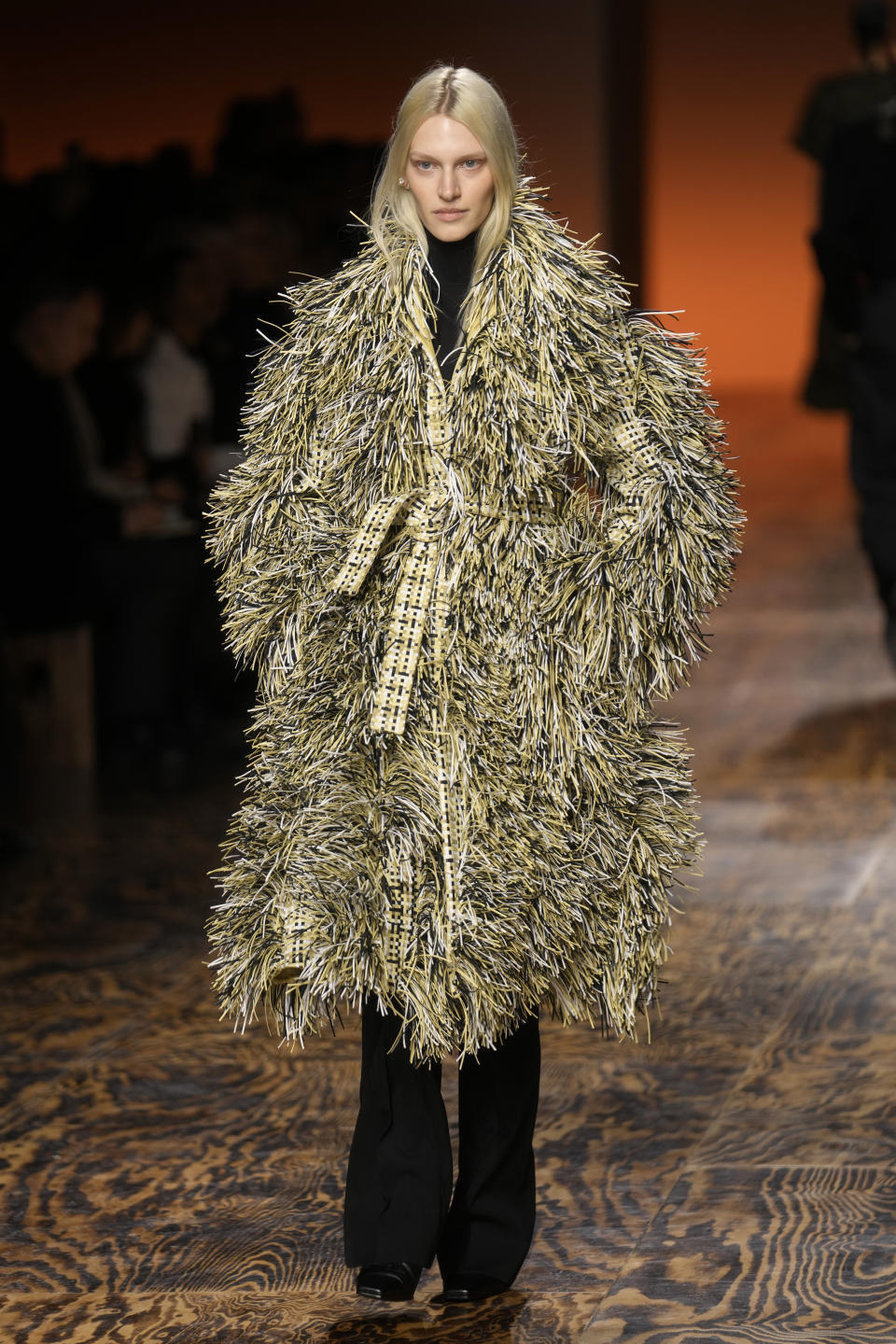 A model wears a creation as part of the Bottega Veneta women's Fall-Winter 2024-25 collection presented in Milan, Italy, Saturday, Feb. 24, 2024. (AP Photo/Luca Bruno)