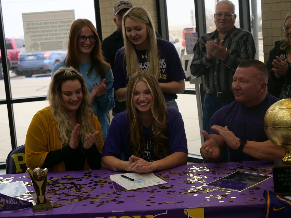 Panhandle's Grace Sims (seated center) signed her National Letter of Intent to play basketball for Hardin Simmons University as part of National Signing Day on Wednesday, February 1, 2023 at Panhandle High School.