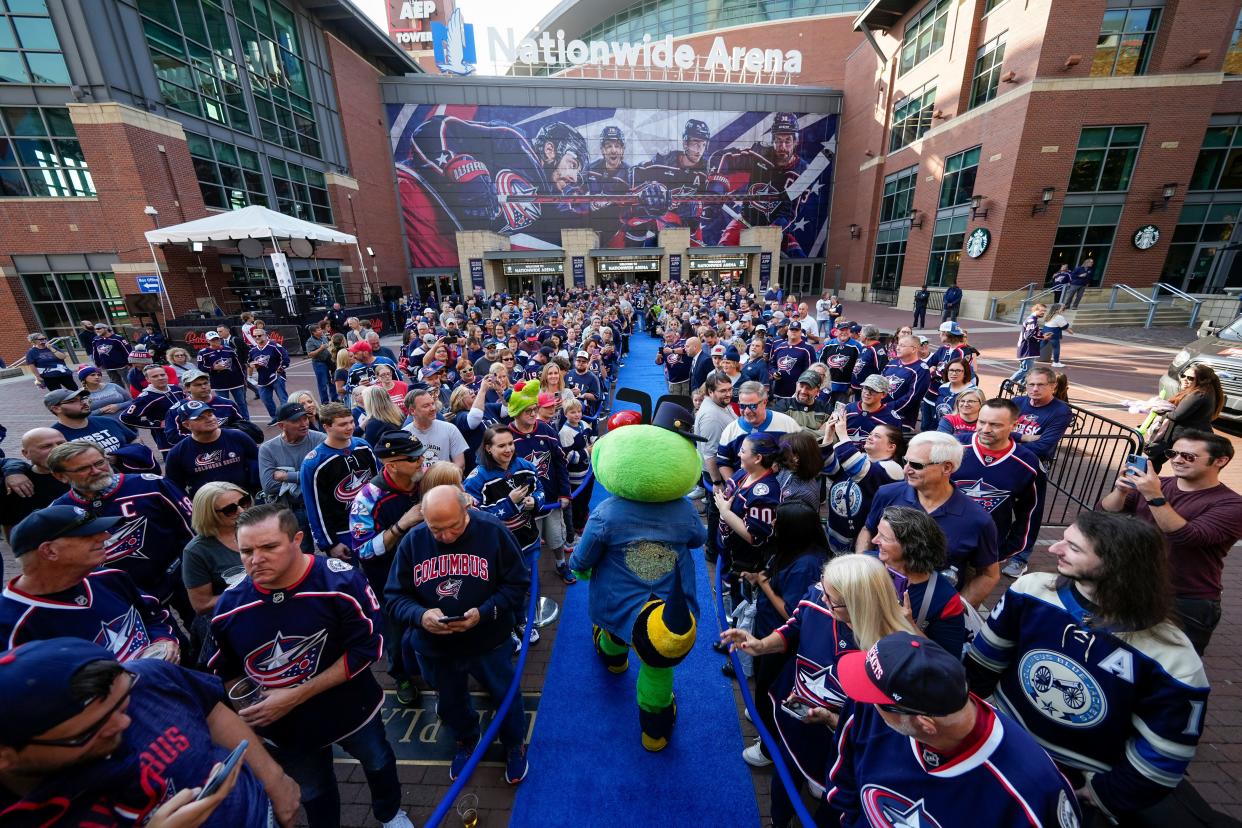 Oct 12, 2023; Columbus, Ohio, USA; Columbus Blue Jackets mascot Stinger arrives on the blue carpet during the Plaza Party prior to the season opener against the Philadelphia Flyers at Nationwide Arena.