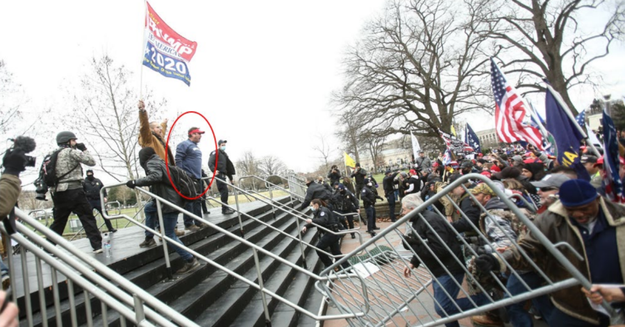 Schubert, circled in red, outside of the Capitol building. (DOJ) 