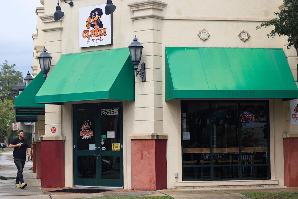 Clay Tinkle walks to the new Clarke Bros Subs to pick up lunch during a break from his job at the Glass Factory on Tuesday, Sept. 26, 2023.