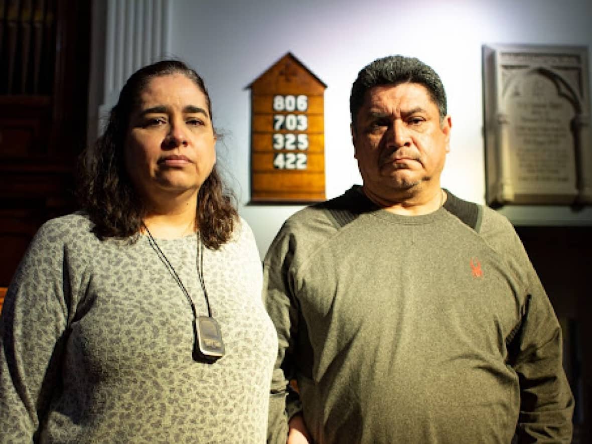 Georgina Flores and her husband Manuel Rodriguez have been living at the Plymouth-Trinity United Church in Sherbrooke, Que., for over a year to avoid deportation to Mexico, where they say their lives would be in danger from organized crime. (Sandra Hercegova/CBC - image credit)