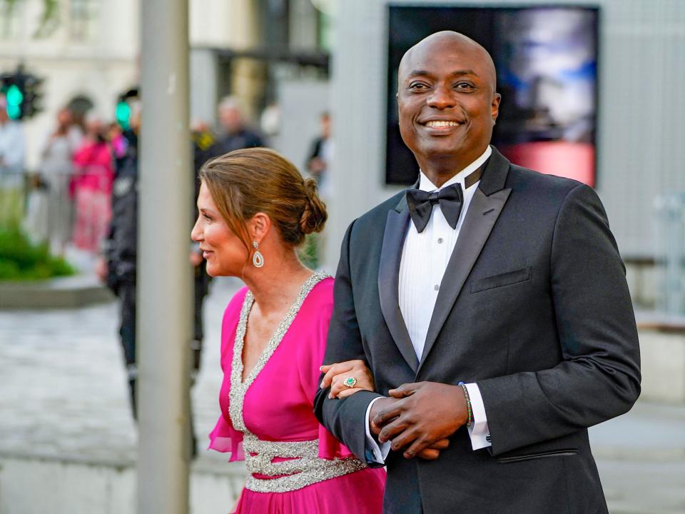 Princess Martha-Louise of Norway (L) and her fiancé self-professed shaman Durek Verrett (R) arrive at the government's party celebratation of Norway's Princess' 18th birthday at Deichman Bjoervika, Oslo's main library, in Oslo, Norway, on June 16, 2022,