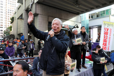 Occupy Central pro-democracy movement founder Chu Yiu-ming, waves to supporters as he takes part in an annual New Year's Day march in Hong Kong, China January 1, 2019. REUTERS/Tyrone Siu