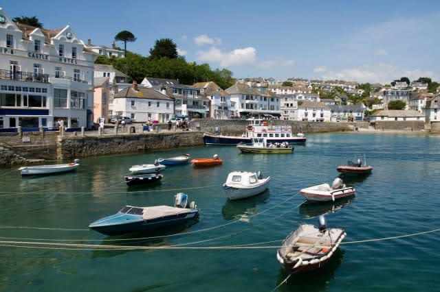 St Mawes harbour river trip boat and the Falmouth to Trelissick Ferry arrives at water front on high tide