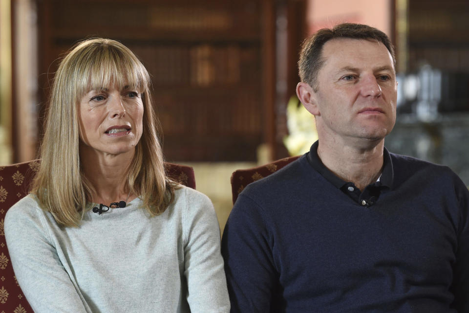 Kate and Gerry McCann, whose daughter Madeleine disappeared from a holiday flat in Portugal ten-years ago, react during a BBC TV interview in Loughborough, England, Friday April 28, 2017.  The parents of Madeleine McCann have vowed to do "whatever it takes for as long as it takes" to find her as they prepare to mark the tenth anniversary of her disappearance on the evening of 3 May 2007, from her bed in a holiday apartment in Praia da Luz resort in the Algarve, Portugal. (Joe Giddens/Pool via AP)