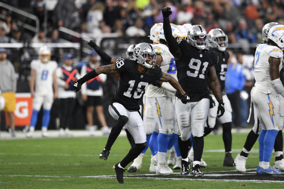 LAS VEGAS, NEVADA – DECEMBER 14: Cornerback Jack Jones #18 of the Las Vegas Raiders celebrates making a tackle against the Los Angeles Chargers in the second quarter at Allegiant Stadium on December 14, 2023 in Las Vegas, Nevada. The Raiders defeated the Chargers 63-21. (Photo by Candice Ward/Getty Images)