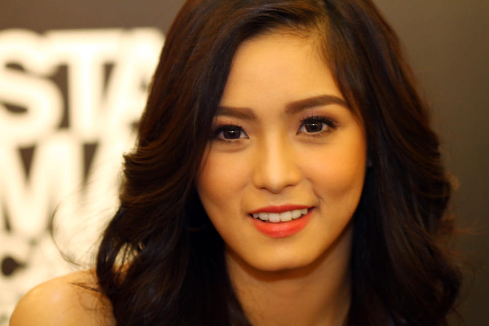 Kim Chiu during the autograph signing of ABS CBN's special annual publication, Star Magic Catalogue 2012, held at Fully Booked, Bonifacio, Taguig City, east of Manila. (Ibarra Siapno/NPPA Images)