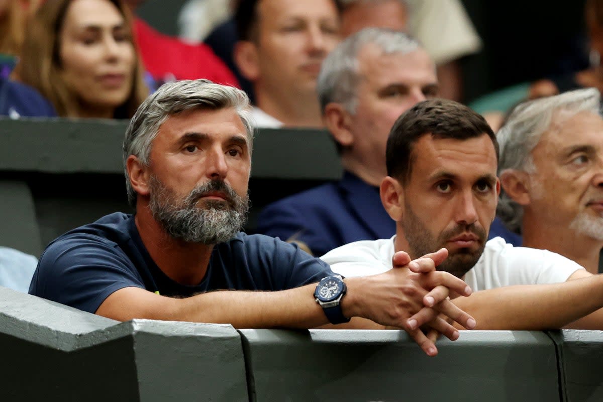 Djokovic’s coach Goran Ivanisevic (left) watches on at Wimbledon, where he was champion in 2001 (Getty Images)