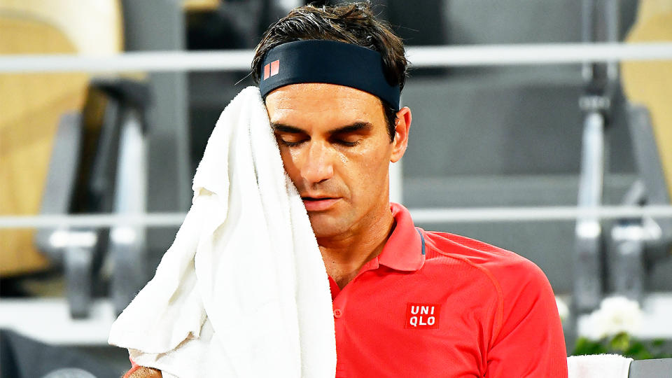 Roger Federer (pictured) looking frustrated and tired during the French Open.