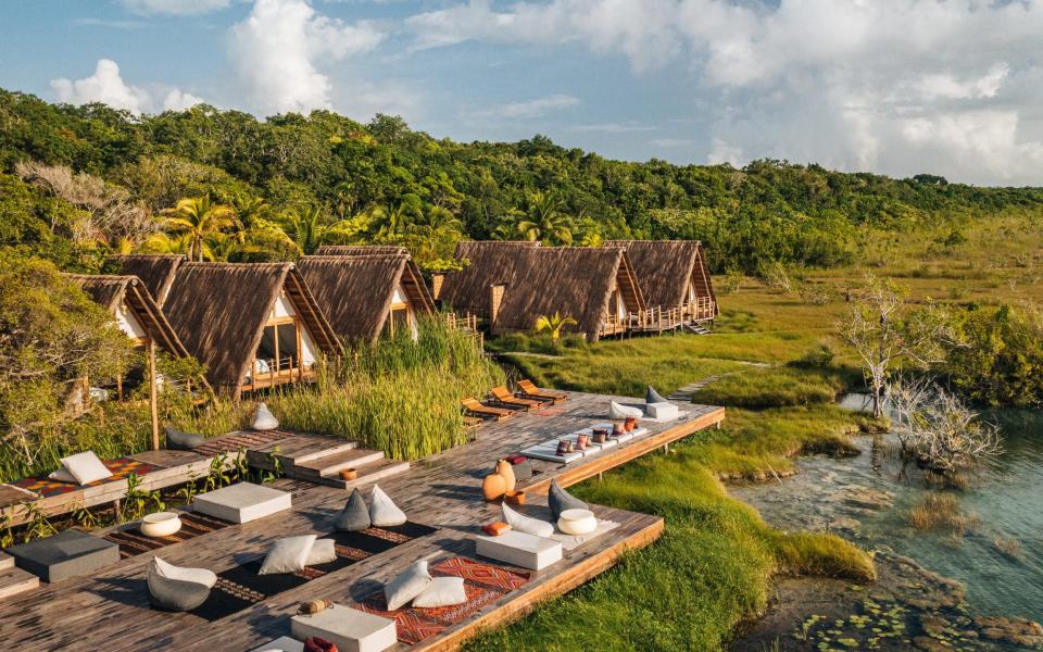 The type A rooms at Our Habitas Bacalar float above the ground, minimizing the impact on the landscape.