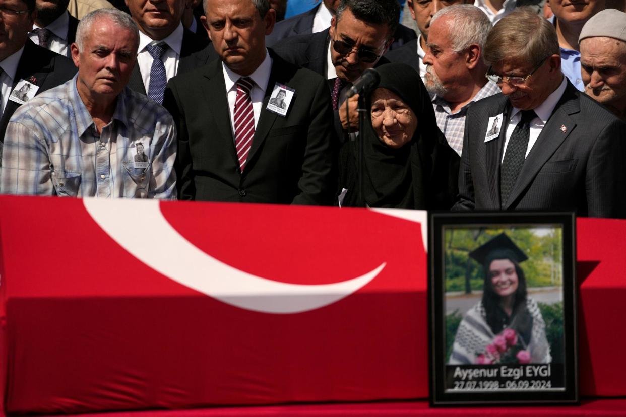 <span>Mehmet Suat Eygi (far left), father of Ayşenur Ezgi Eygi, during his daughter's funeral in Didim, Turkey, on 14 September 2024.</span><span>Photograph: Khalil Hamra/AP</span>