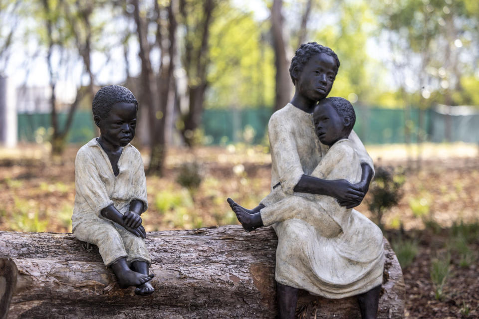 "WHAT IF…," by Sandrine Plante, bronze, 2023, during a media tour of Equal Justice Initiative's new Freedom Monument Sculpture Park, Tuesday, March 12, 2024, in Montgomery, Ala. (AP Photo/Vasha Hunt)