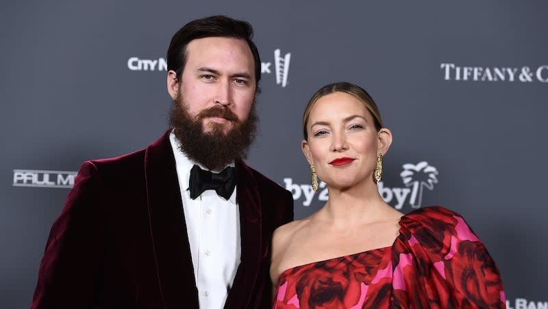 Danny Fujikawa, left, and Kate Hudson arrive at the Baby2Baby Gala at the Pacific Design Center on Saturday, Nov. 13, 2021, in West Hollywood, Calif.