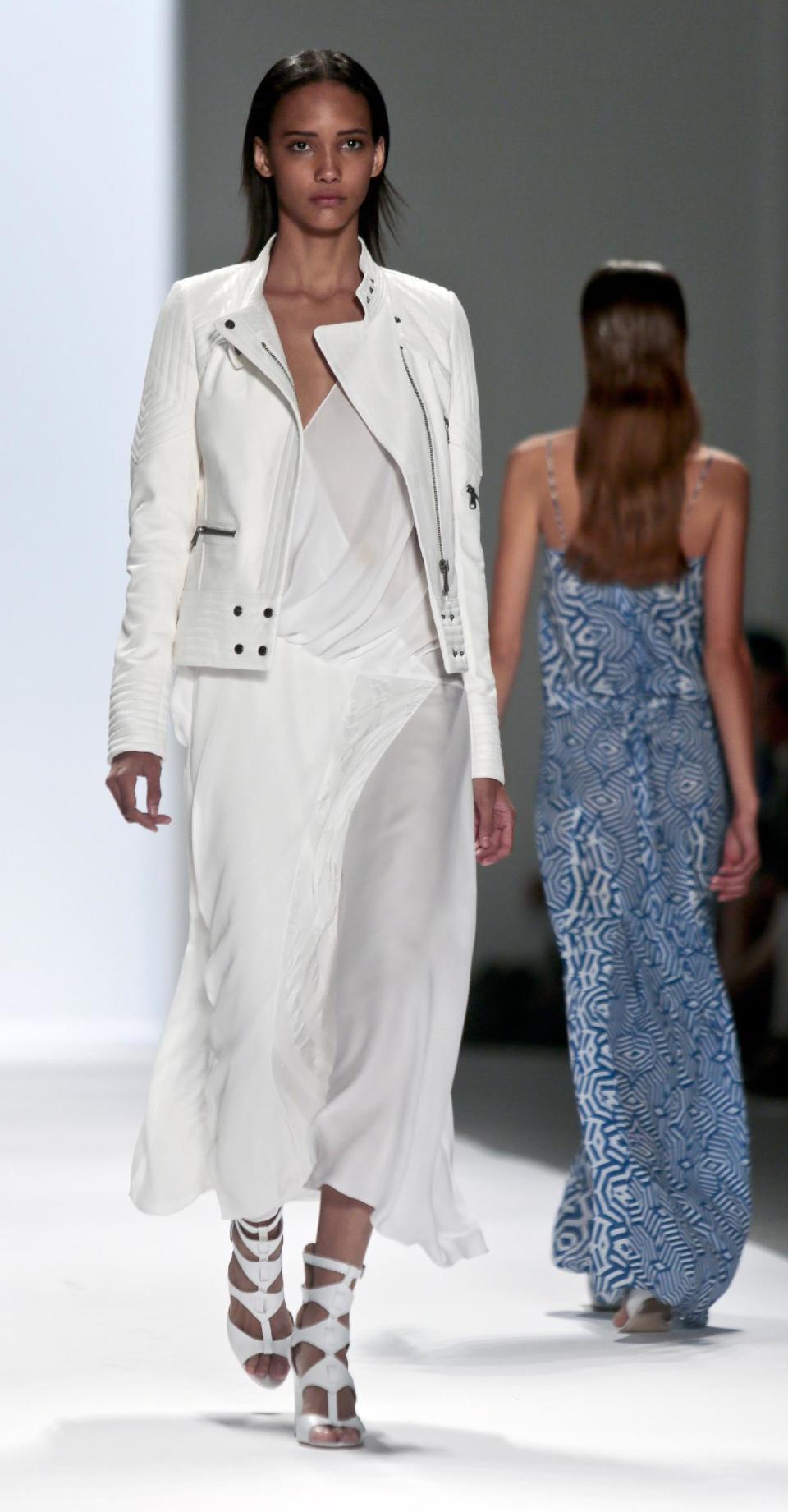 Fashion from the Richard Chai Spring Summer 2014 collection is modeled on Thursday, Sept. 5, 2013, during Fashion Week in New York. (AP Photo/Bebeto Matthews)